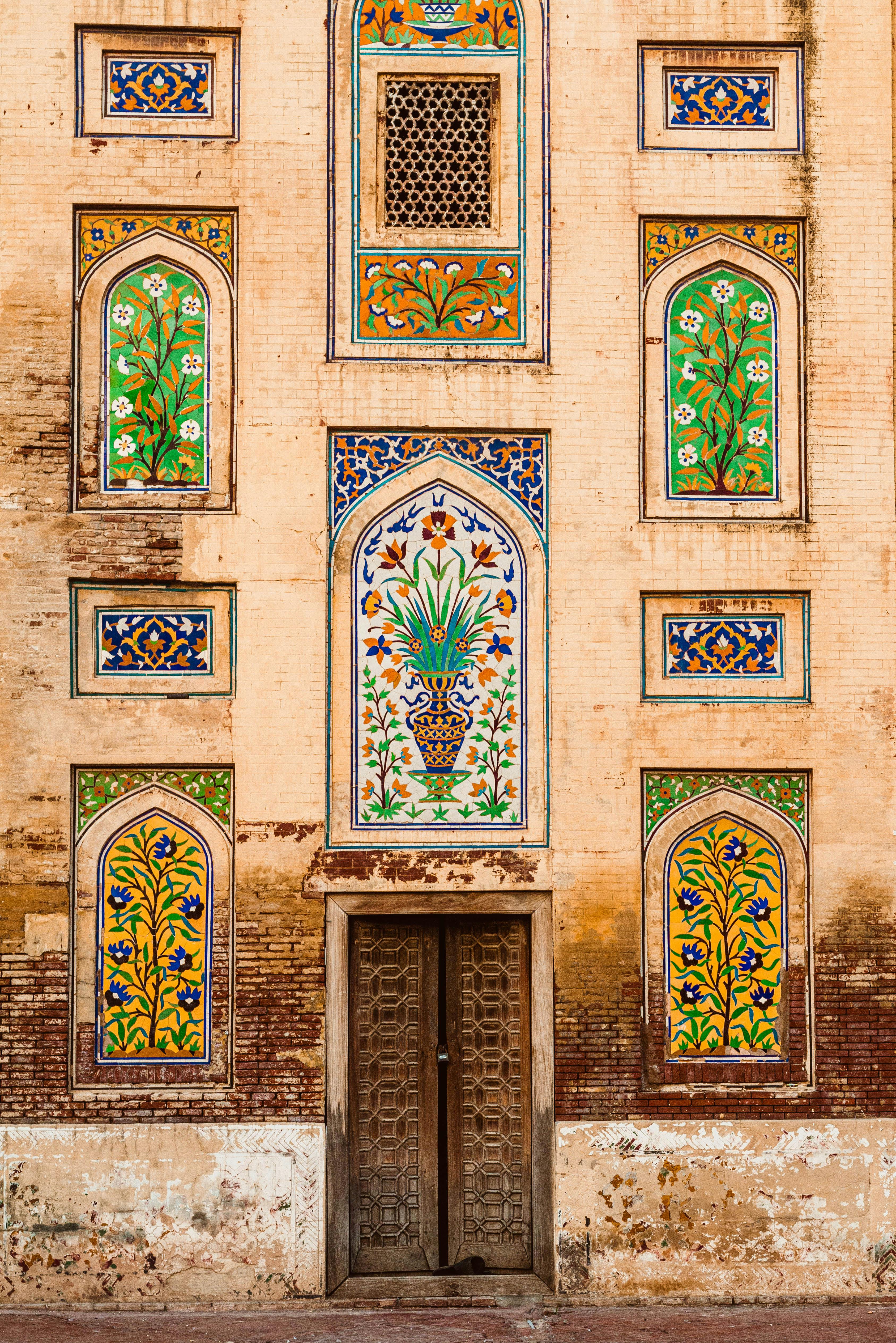 outside home entry decorated with islamic art and mosaics